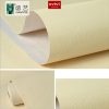 Giấy dán tường có keo sẵn màu vàng nhạt